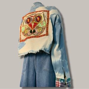 Upcycled Bleach and FadedDenim Jacket with Colorful Sequin Owl on Back.